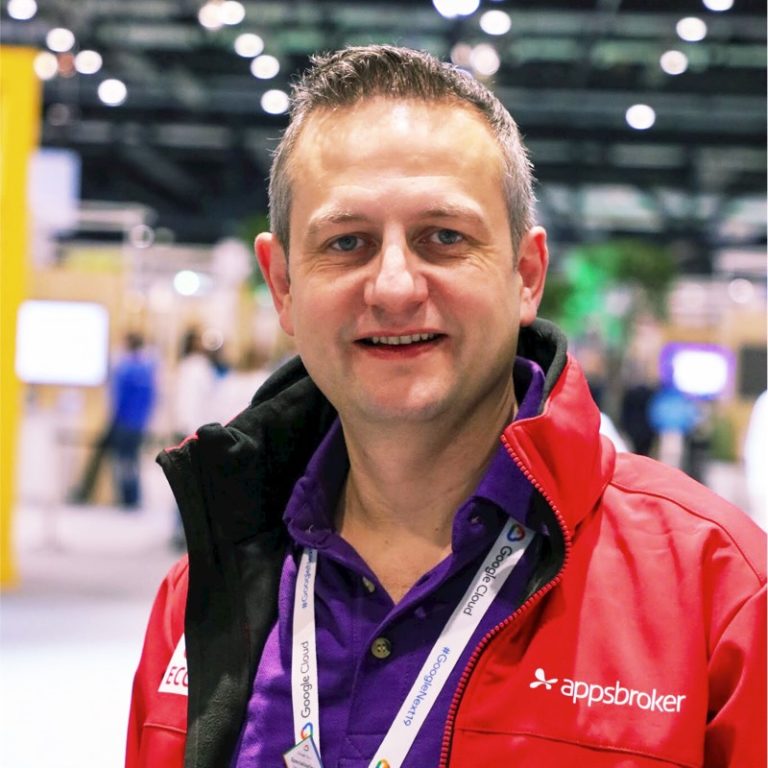 James Alexander at Appsbroker wearing purple branded polo