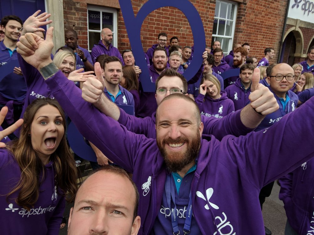 Appsbroker team smiling outside the Swindon office