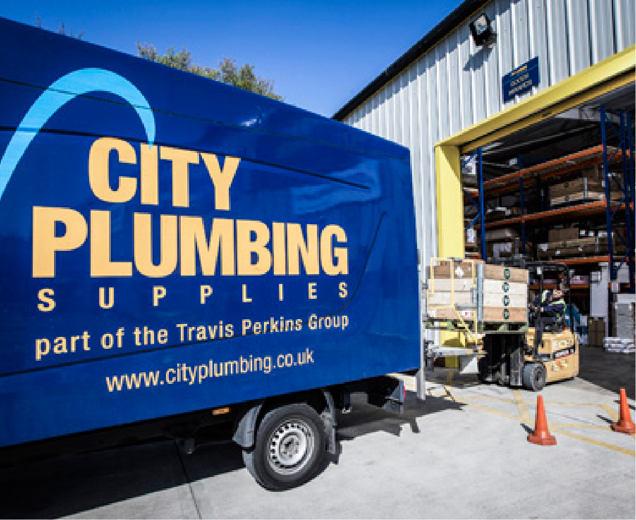 Travis Perkins City Plumbing loading branded lorry
